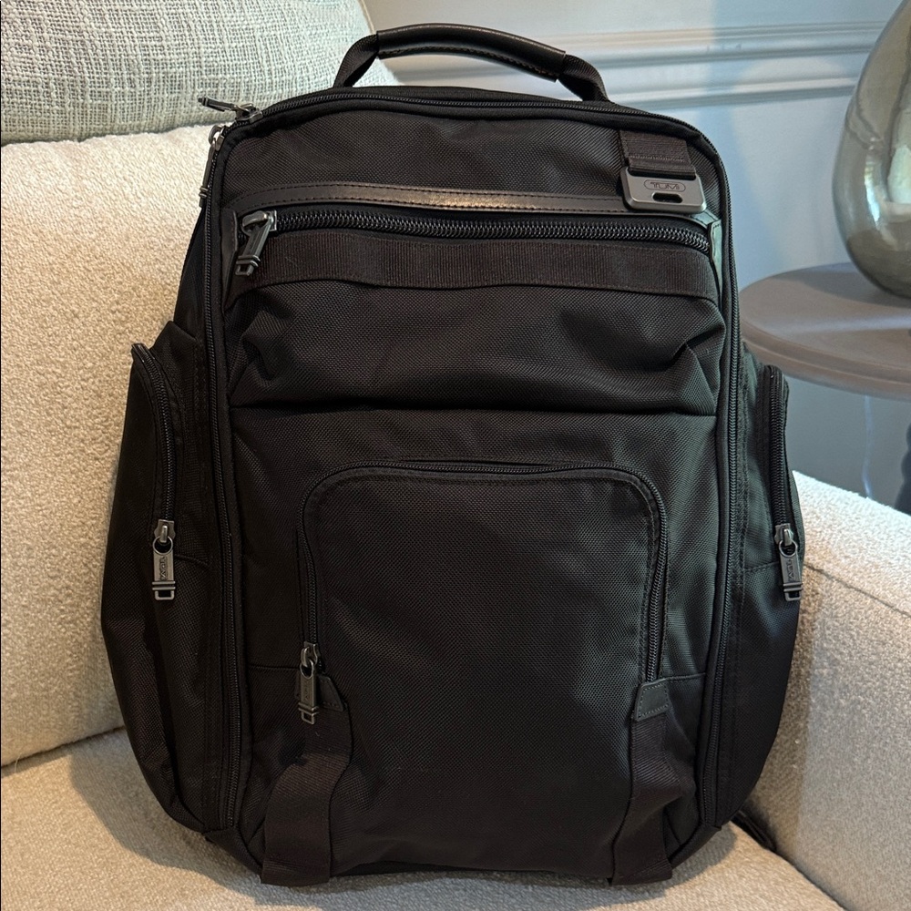 TUMI “like new”Black Backpack